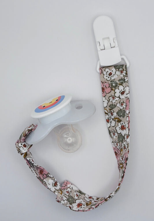 attache-tétine Bubuclip en tissu fleuri rose - petit beba