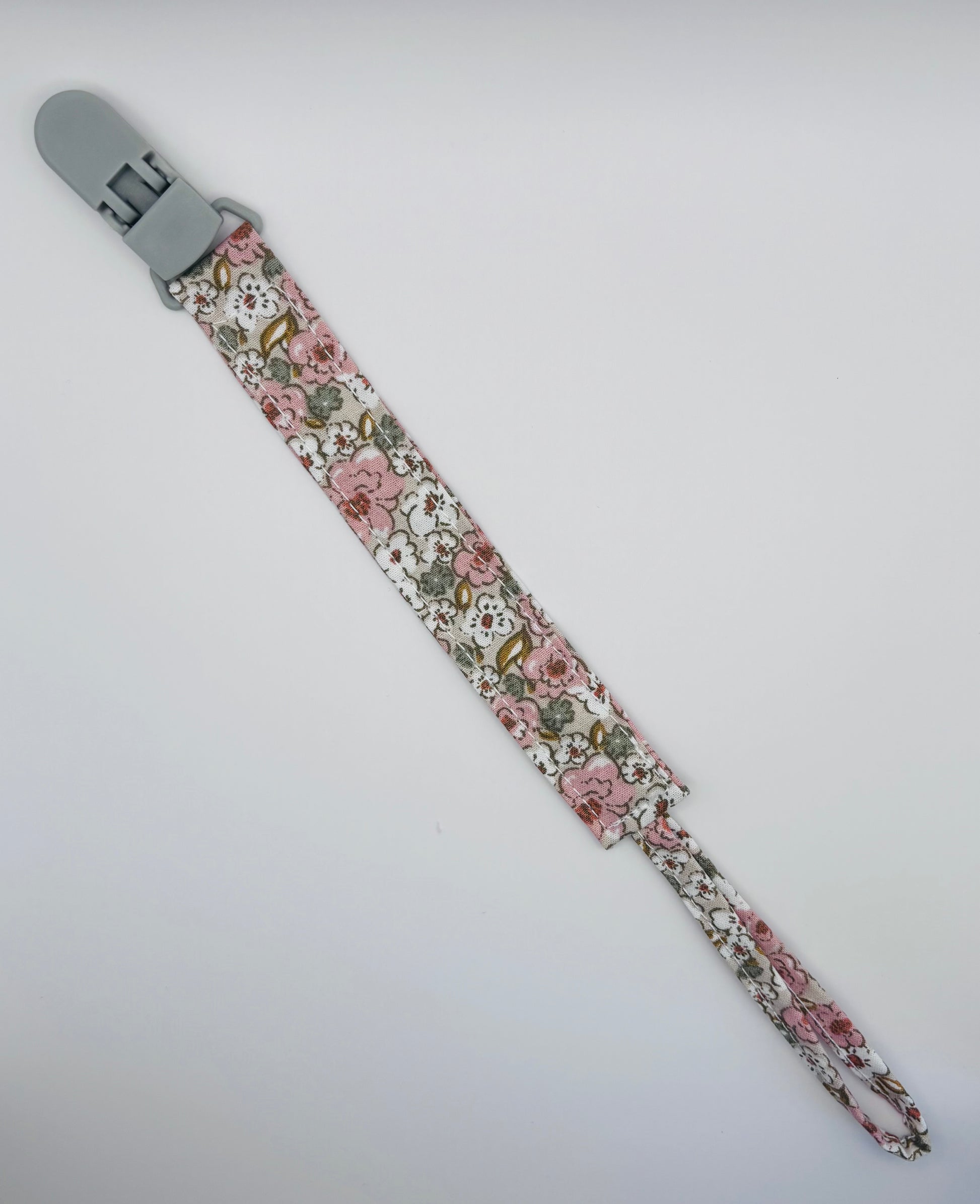 attache-tétine Bubuclip fleuri rose pinse grise - petit beba